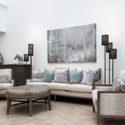 A modern living room with neutral tones and stylish decor.