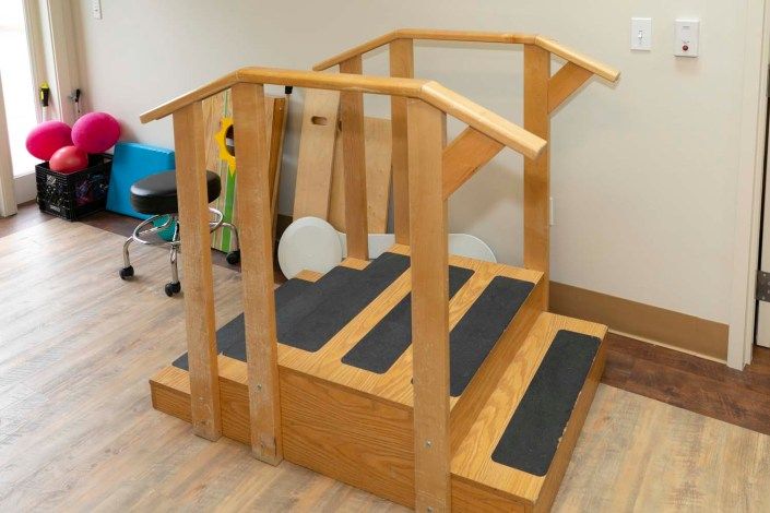Wooden rehabilitation stairs used for physical therapy.