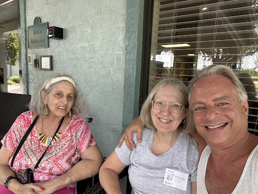 Three friends enjoying a sunny day together.