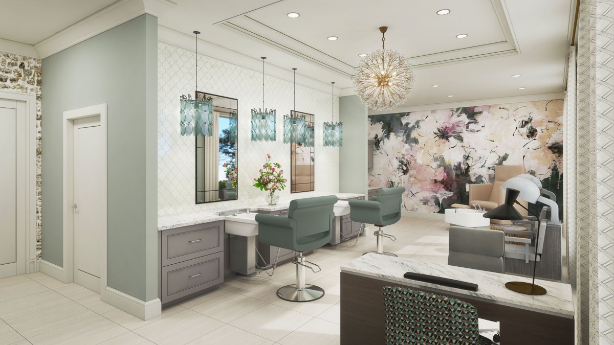 A modern and luxurious salon interior with stylish hairdressing chairs, mirrors, and floral wallpaper.