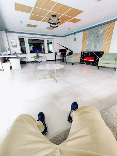A serene waiting area featuring modern furniture and a spacious layout.