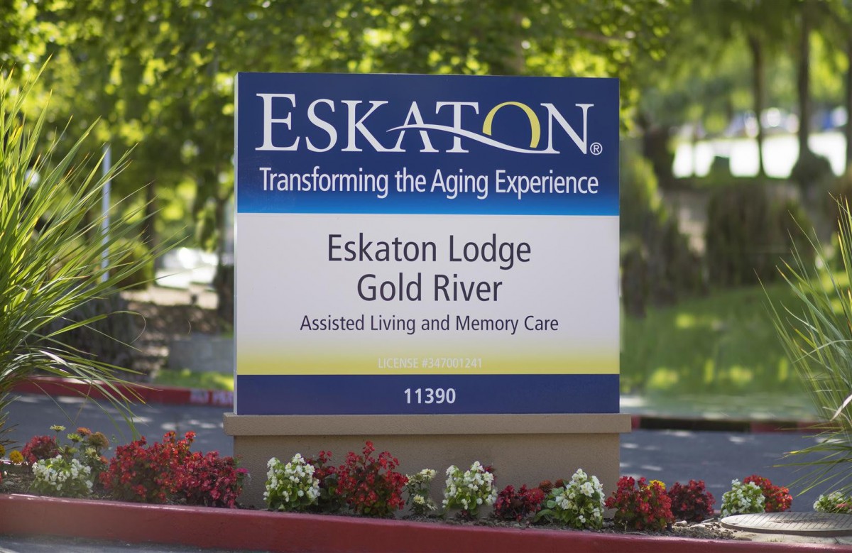 Sign for Eskaton Lodge Gold River offering assisted living and memory care services.