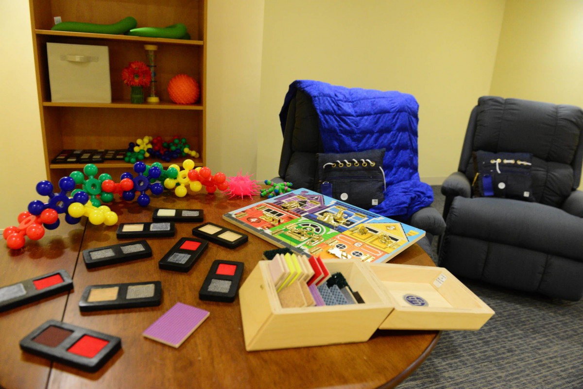 A room with sensory tools and educational toys for occupational therapy.