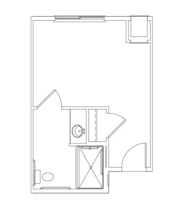 A simple architectural floor plan depicting a small room layout with a bathroom.