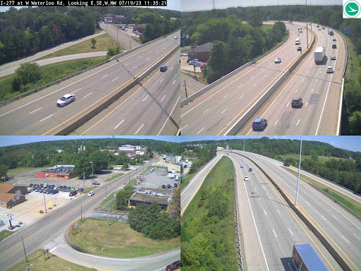 Traffic surveillance view showing multiple angles of a busy highway.