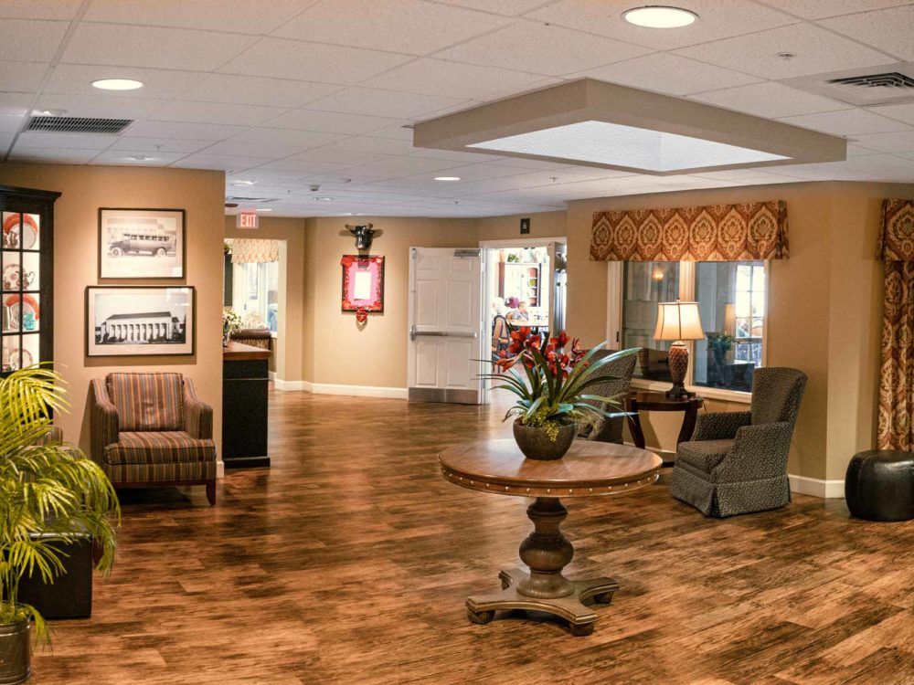 A warmly decorated lobby with comfortable seating and elegant lighting.