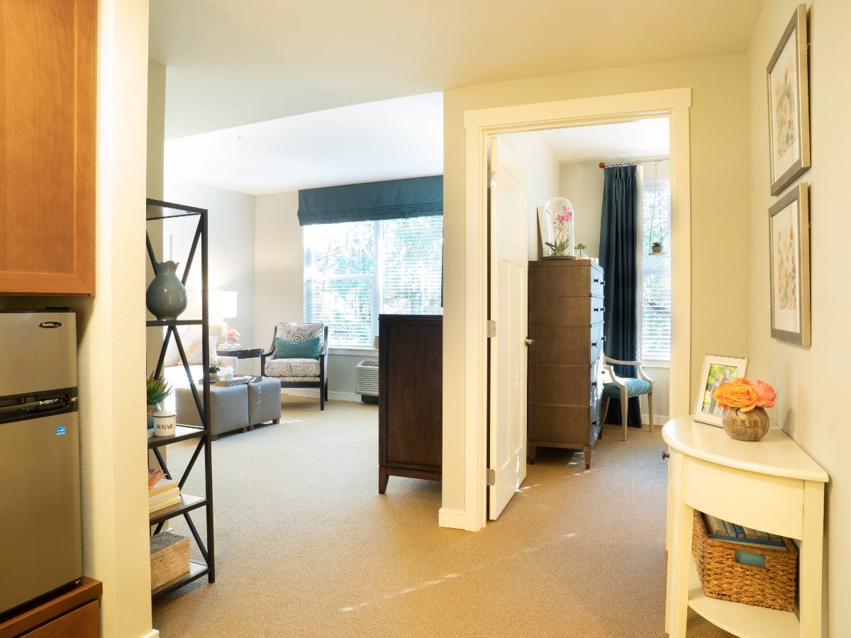 A cozy and modern apartment living room with ample natural light.