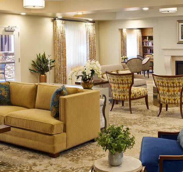 Elegant living room with cozy seating and decorative accents.