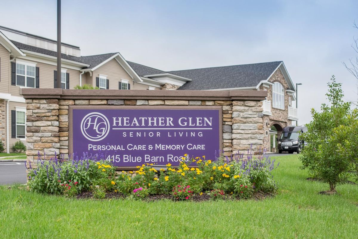The entrance sign for Heather Glen Senior Living, offering residential and memory care services.