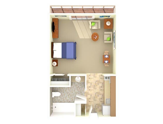 A top-down view of a studio apartment layout showing the placement of furniture and different areas.
