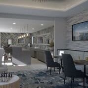 A modern kitchen interior with stylish furniture and ambient lighting.