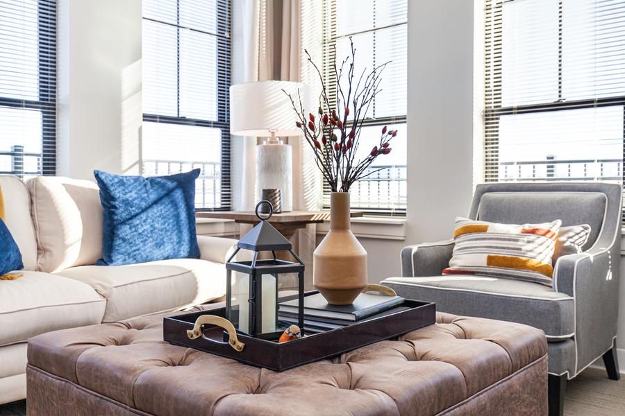 A cozy living room with stylish decor and natural light.