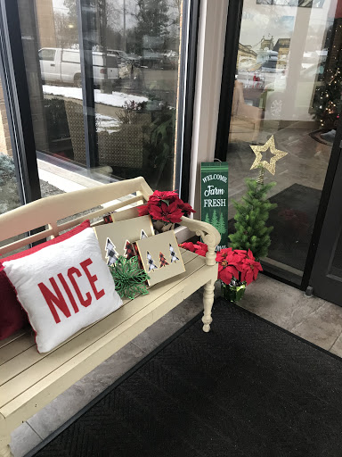 A cozy holiday corner with festive decor, perfect for welcoming guests.