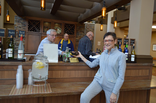 A lively bar scene where guests enjoy drinks and good company.