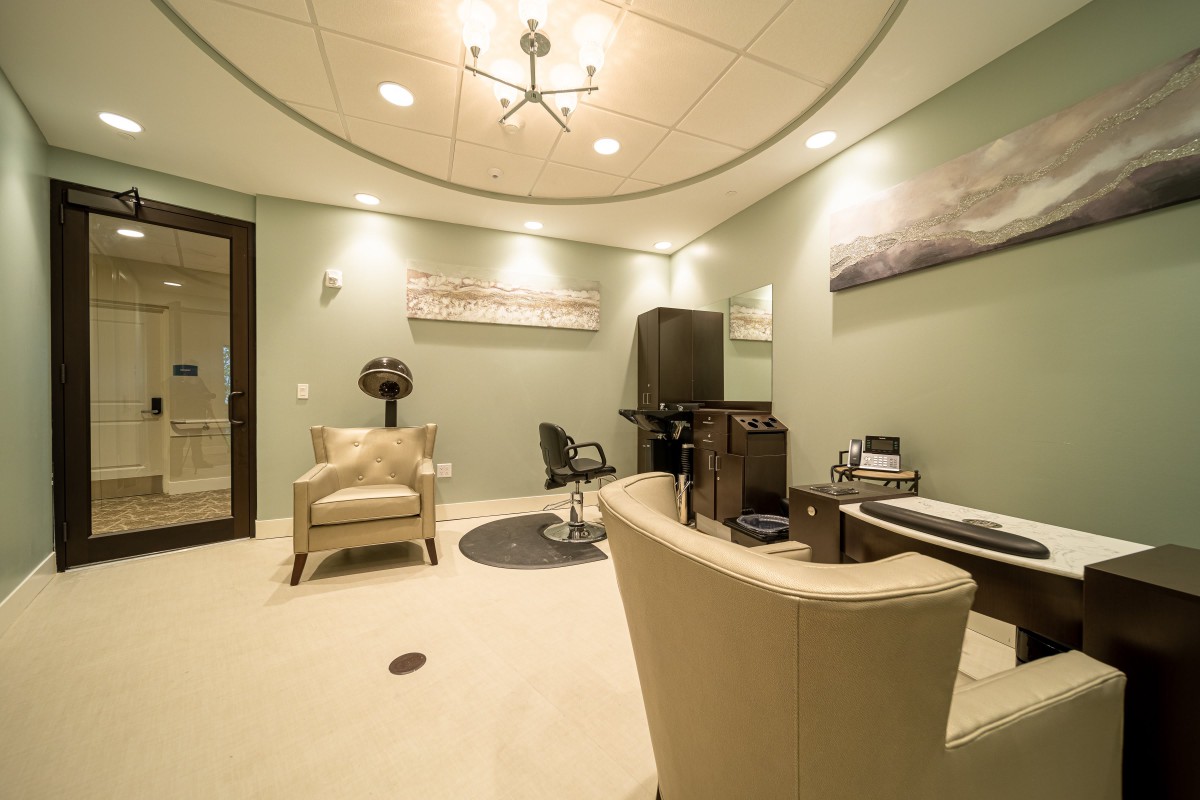 A modern office space with comfortable seating and stylish decor.