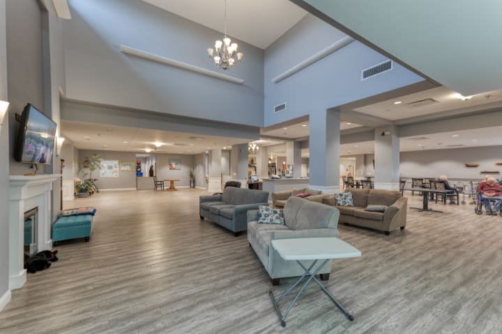 A modern and spacious interior lobby with comfortable seating and elegant lighting.