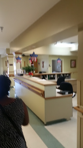 A welcoming reception area with patriotic decorations.