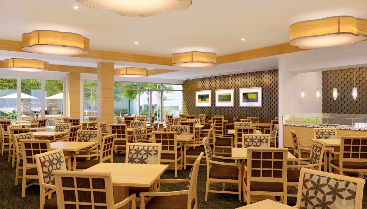 A modern restaurant dining area with neatly arranged tables and chairs.