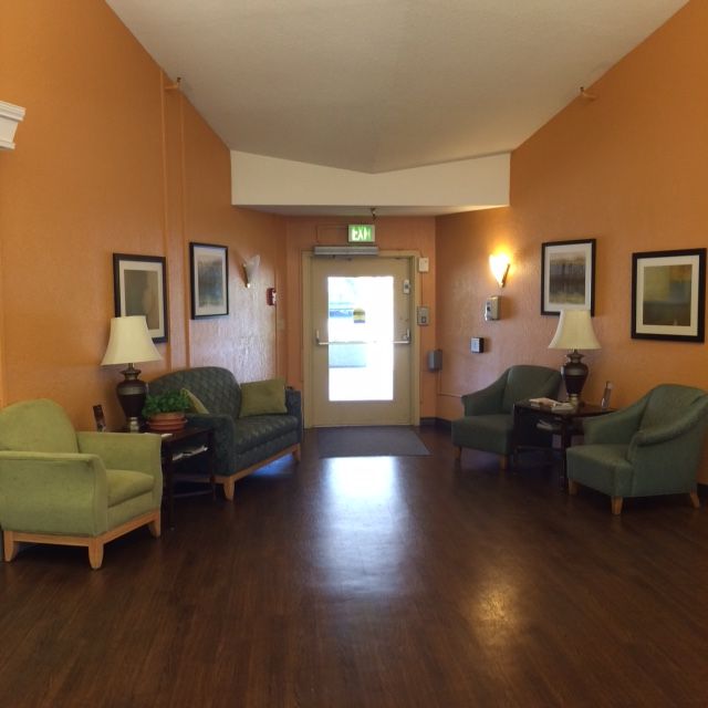 A welcoming lobby area with comfortable seating and warm lighting.