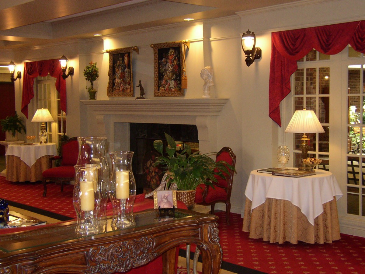 An elegant restaurant interior with classic decor and warm lighting.