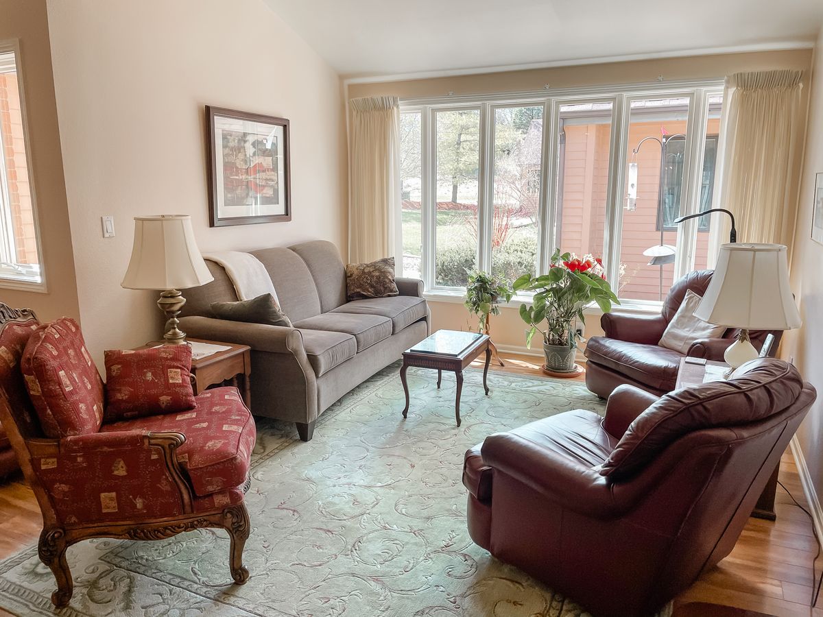 A cozy living room with comfortable seating and natural light.