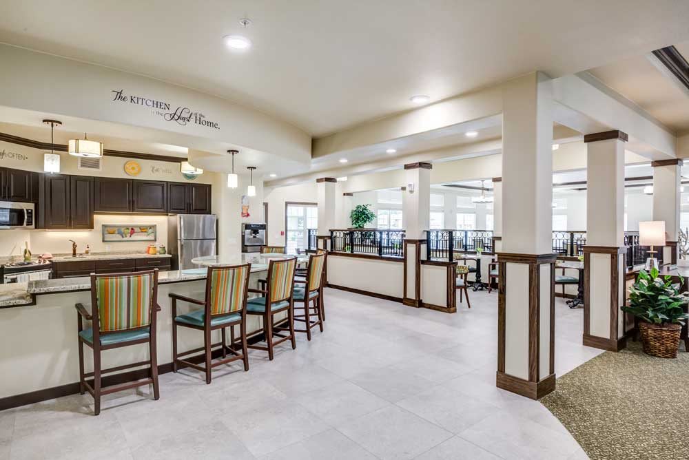 A modern lobby with seating areas and bright lighting.