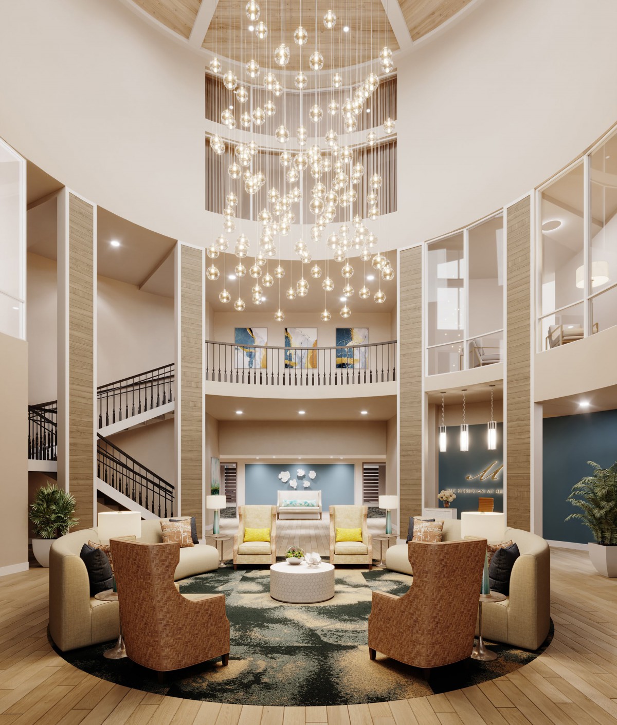 A luxurious lobby with an elegant chandelier and a comfortable seating area.