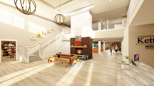 A bright and inviting modern lobby featuring a cozy fireplace and stylish furnishings.