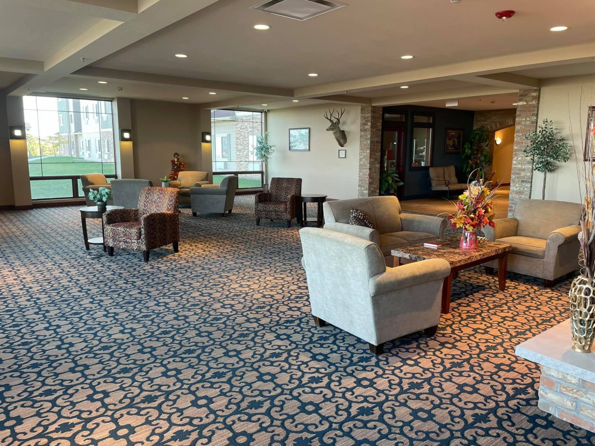 A spacious lobby with comfortable seating and elegant decor.