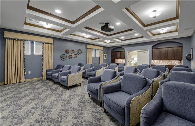 A modern, spacious room with comfortable seating and stylish design.