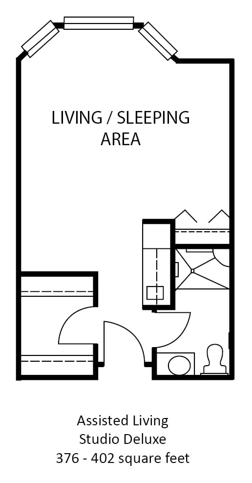 A floor plan showcasing a studio apartment with a living/sleeping area, bathroom, and kitchen space.