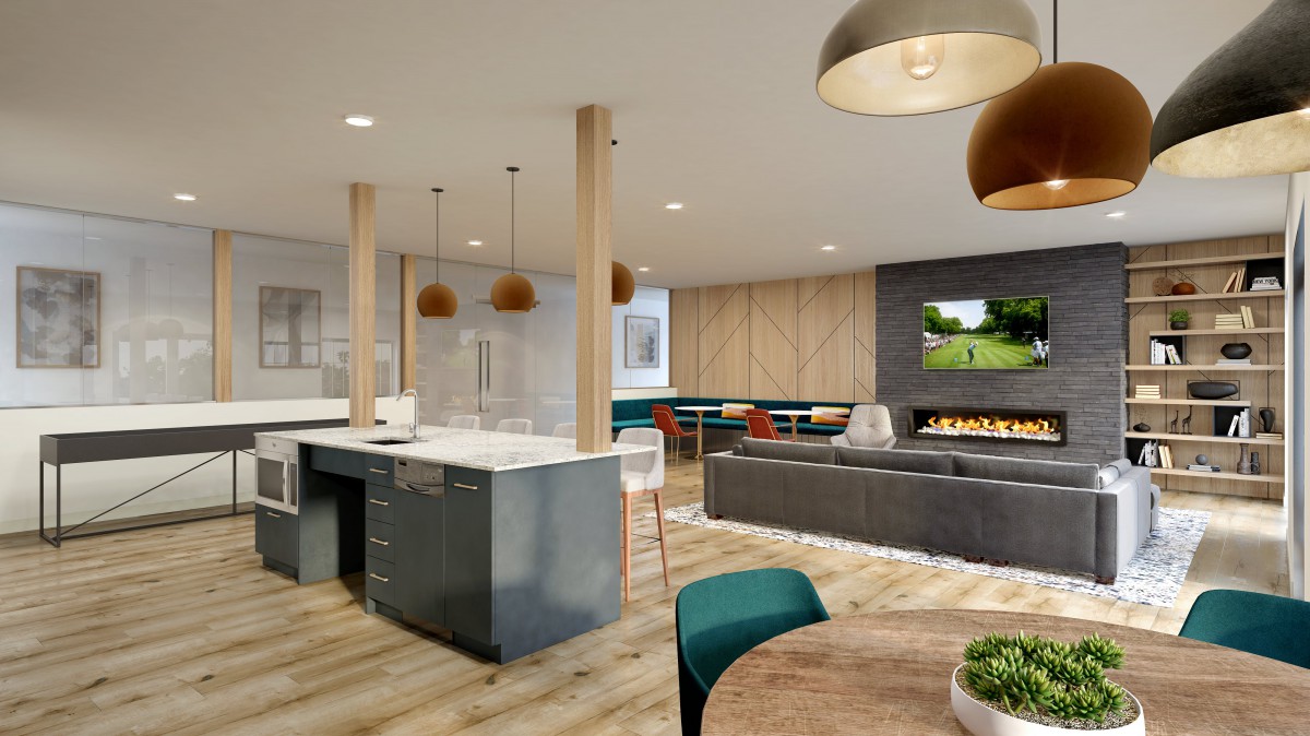 A modern open floor plan featuring a stylish kitchen and cozy living area.