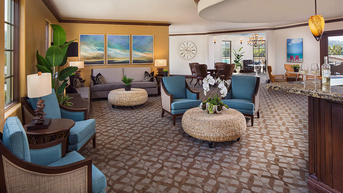A modern hotel lobby with stylish seating and decor.