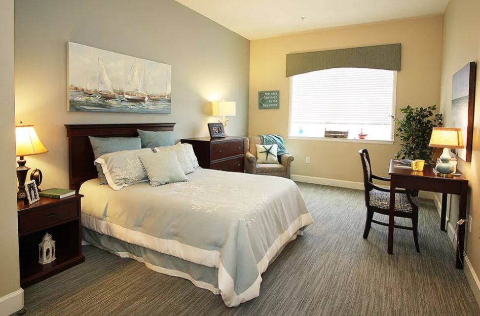 A cozy and elegantly decorated bedroom with soft lighting.