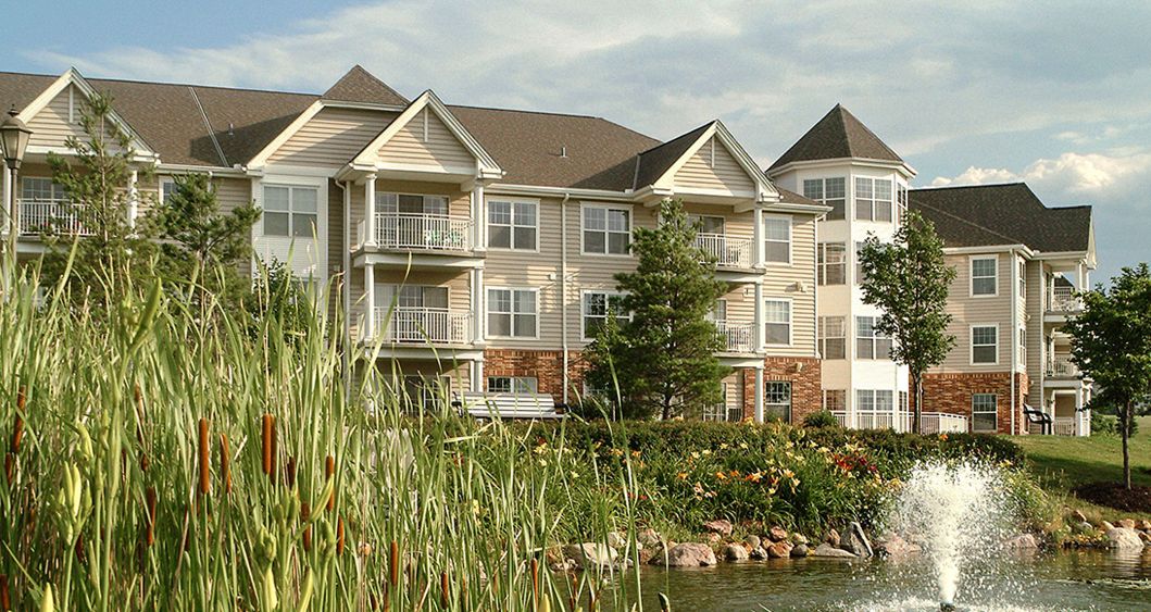 Images showing dining, interior, seating area, fireplace, artwork, apartment building, landscaping, lake, and more.