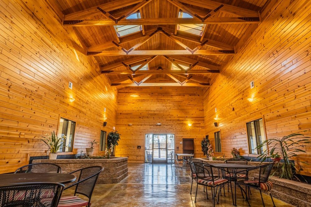 A cozy dining area with wooden interiors and rustic charm.