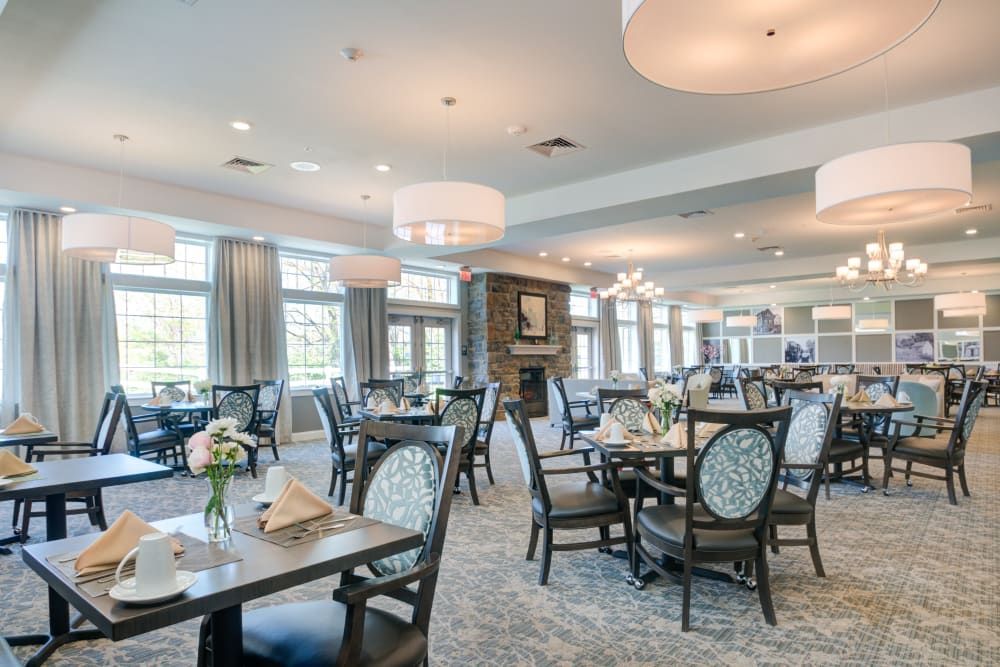 Spacious and elegant dining area with modern furnishings.