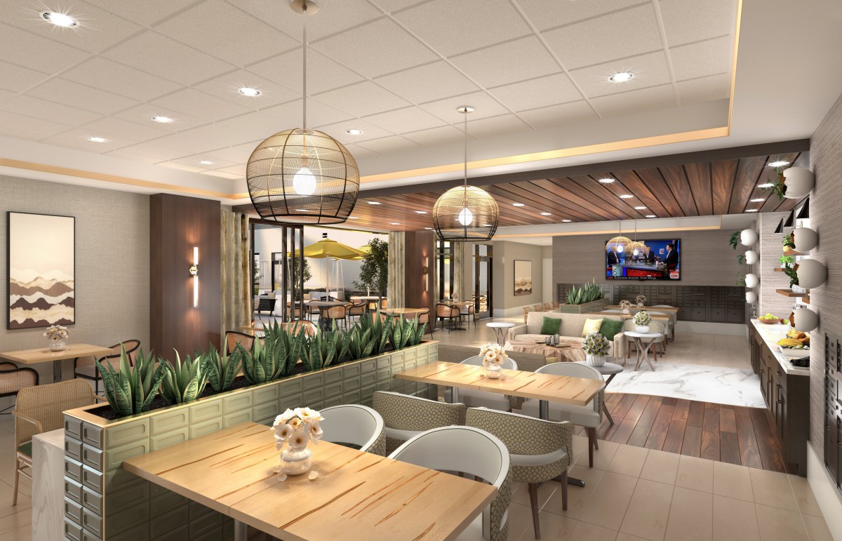 A modern restaurant interior featuring stylish furniture and elegant lighting.