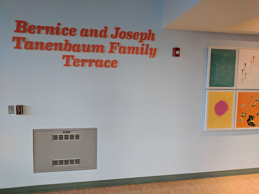The wall features a sign for the Bernice and Joseph Rosenbaum Family Terrace.
