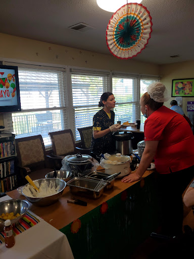 An engaging cooking session with participants sharing tips and recipes.