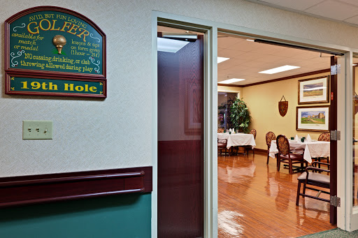 A glimpse into a dining area, revealing well-set tables and a welcoming ambiance.
