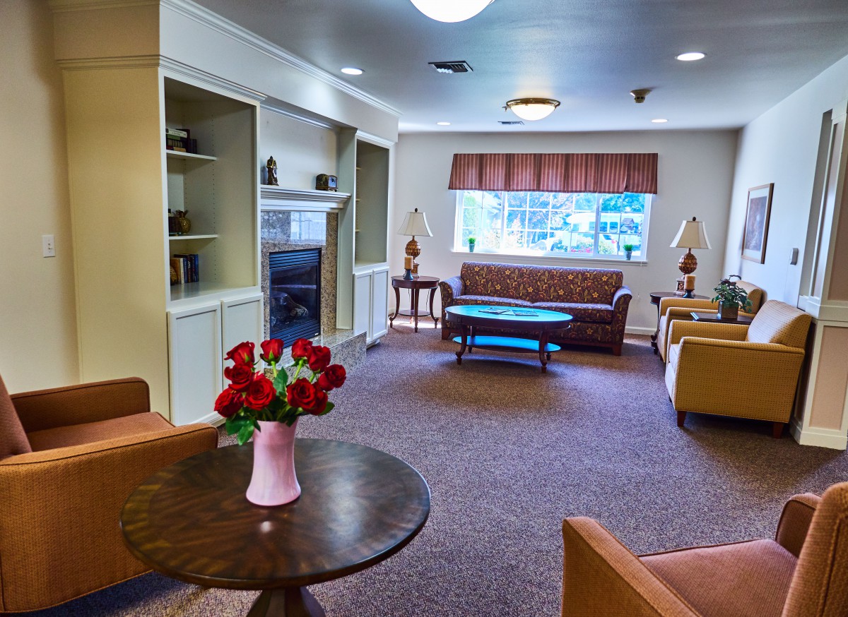 A cozy living room with comfortable seating and a warm, welcoming atmosphere.