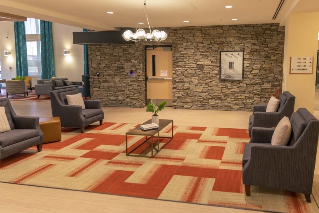 A modern lobby with comfortable seating and stylish decor.