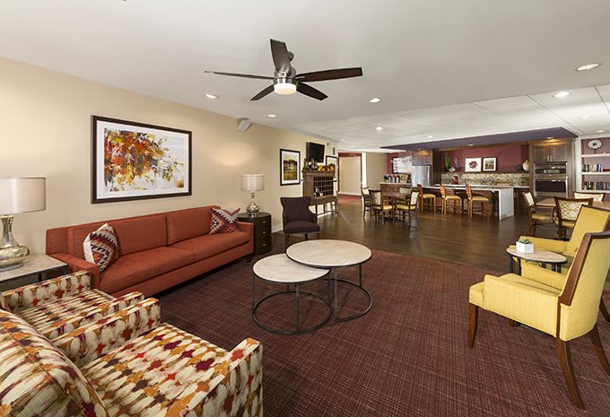 A modern living room with stylish furniture and open space layout.