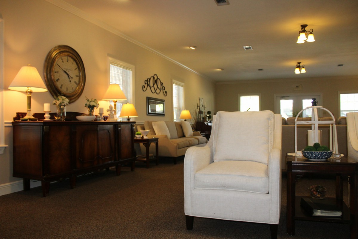 A cozy living room with elegant furniture and soft lighting.