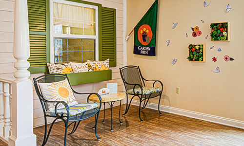 A cozy waiting area with colorful decor and comfortable seating.