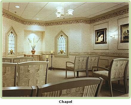 A serene chapel interior featuring elegant furniture and decorative elements.