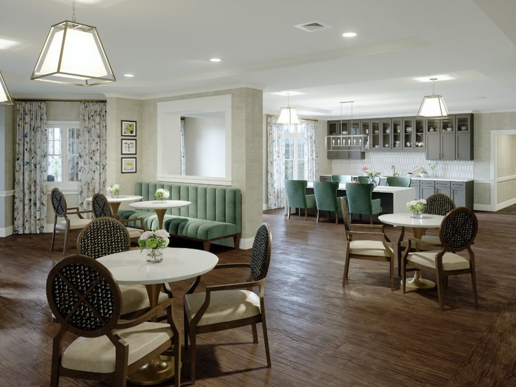 A modern and elegant dining area with neatly arranged tables and chairs.