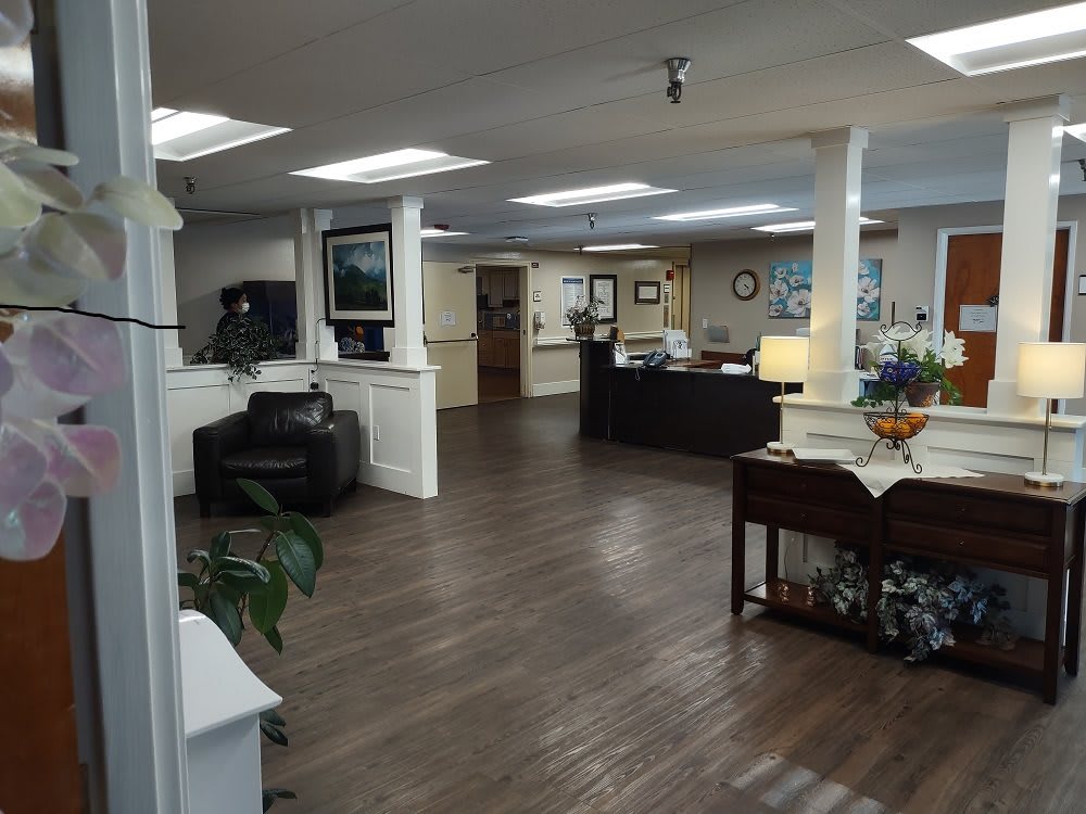 A spacious office reception area with furniture and decor.