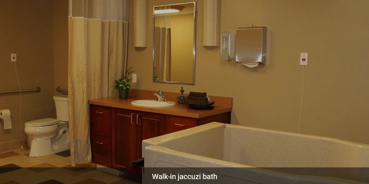 A modern bathroom featuring a walk-in jacuzzi bath.